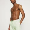 Pier One Uomo PEACHY SOFT BEACH SHORTS - Shorts Da Mare - Light Green